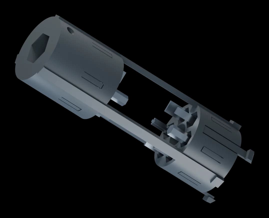 Cover-removed concept view of the exposed magazine carrier, showing eleven stored bits, twelve wells and twelve separate magnets.